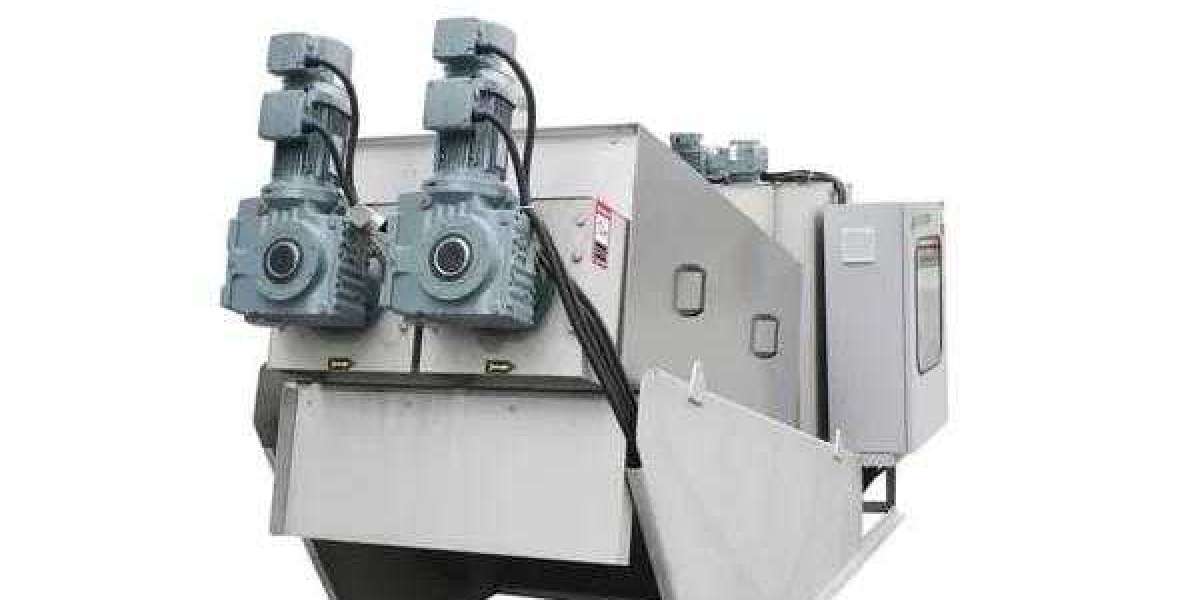 Sludge dewatering belt press